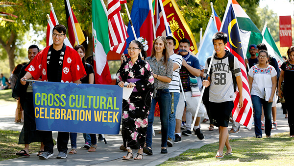 Students marching in the Cross Cultural Diversity parade