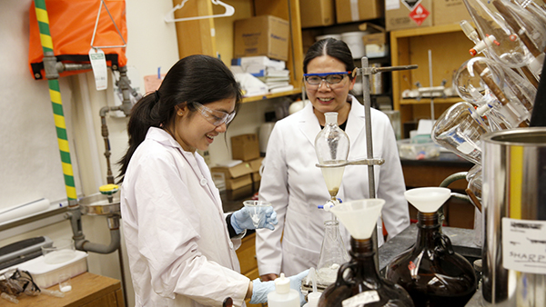 Female faculty and student in a lab