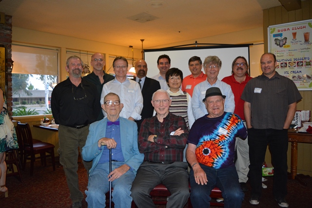 Dr. John Donaldson with faculty from the physics department.