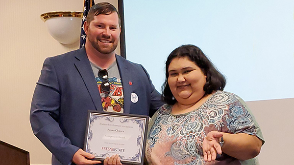 Dr. Colin Stewart, associate dean of Student Involvement, with Susan Chavez.