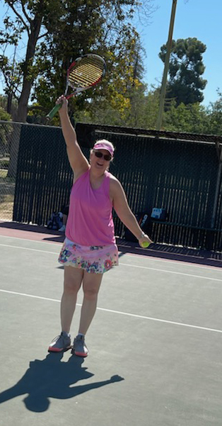 Candace Egan playing tennis.