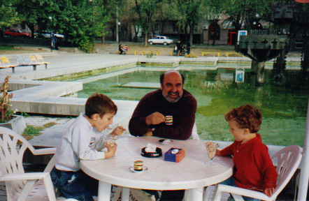 With her husband, Sartkisi Harootunian, drinking demitasse, and sons Dante and Dylan eating vanilla ice cream in Yerevan