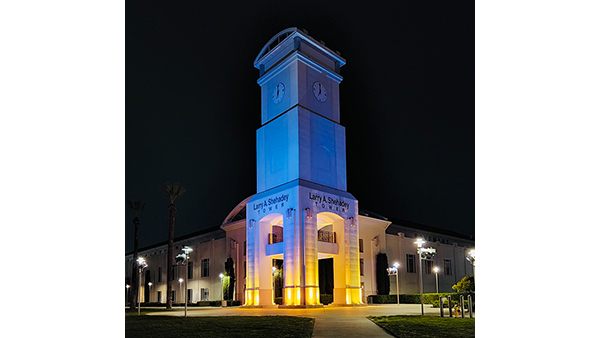 The Larry Shehadey Tower at the Save Mart Center lit in the Ukrainian colors. of blue and yellow.