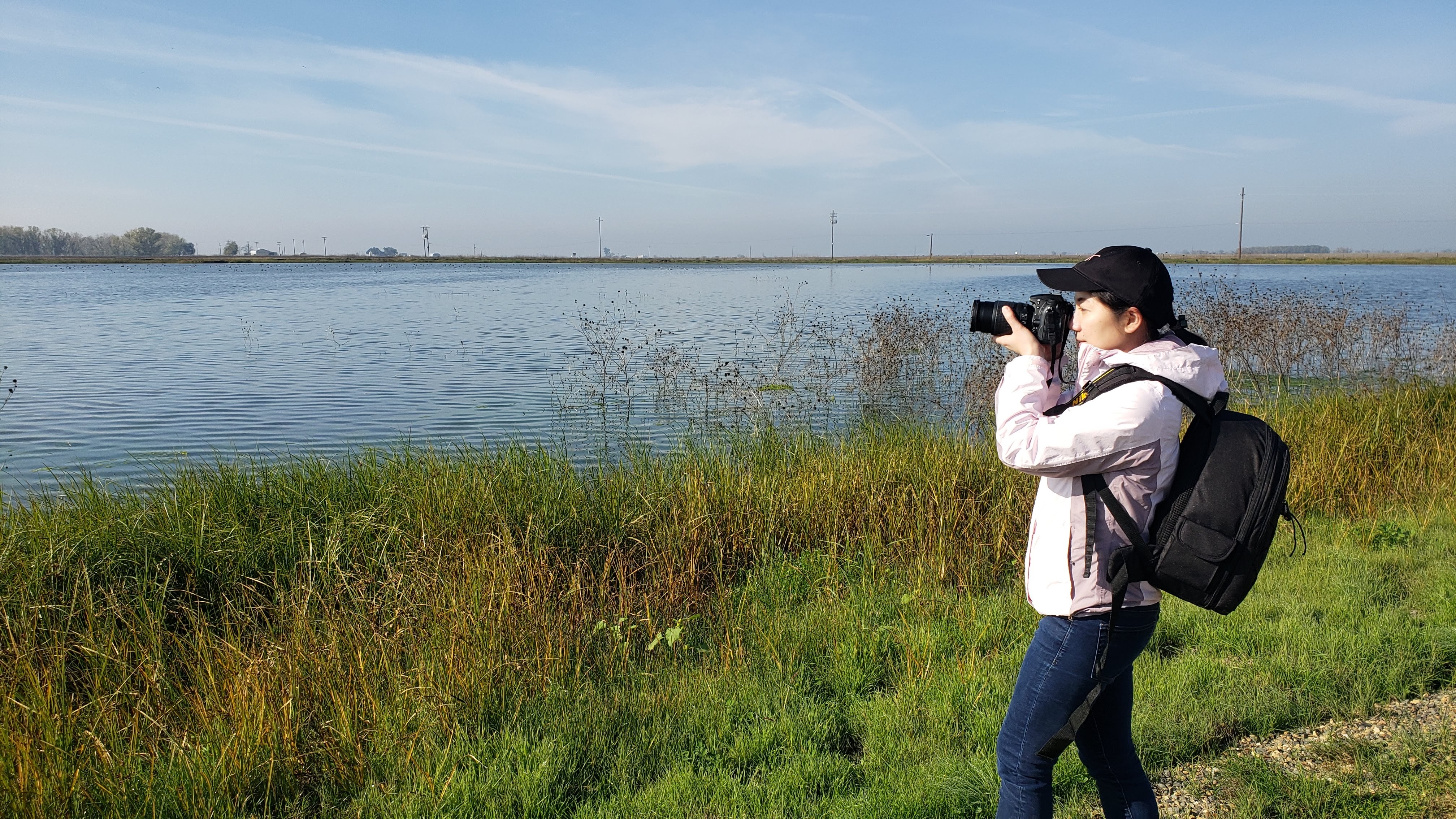 Qin Fan photographing wildlife at the Merced National Wildlife Refuge.
