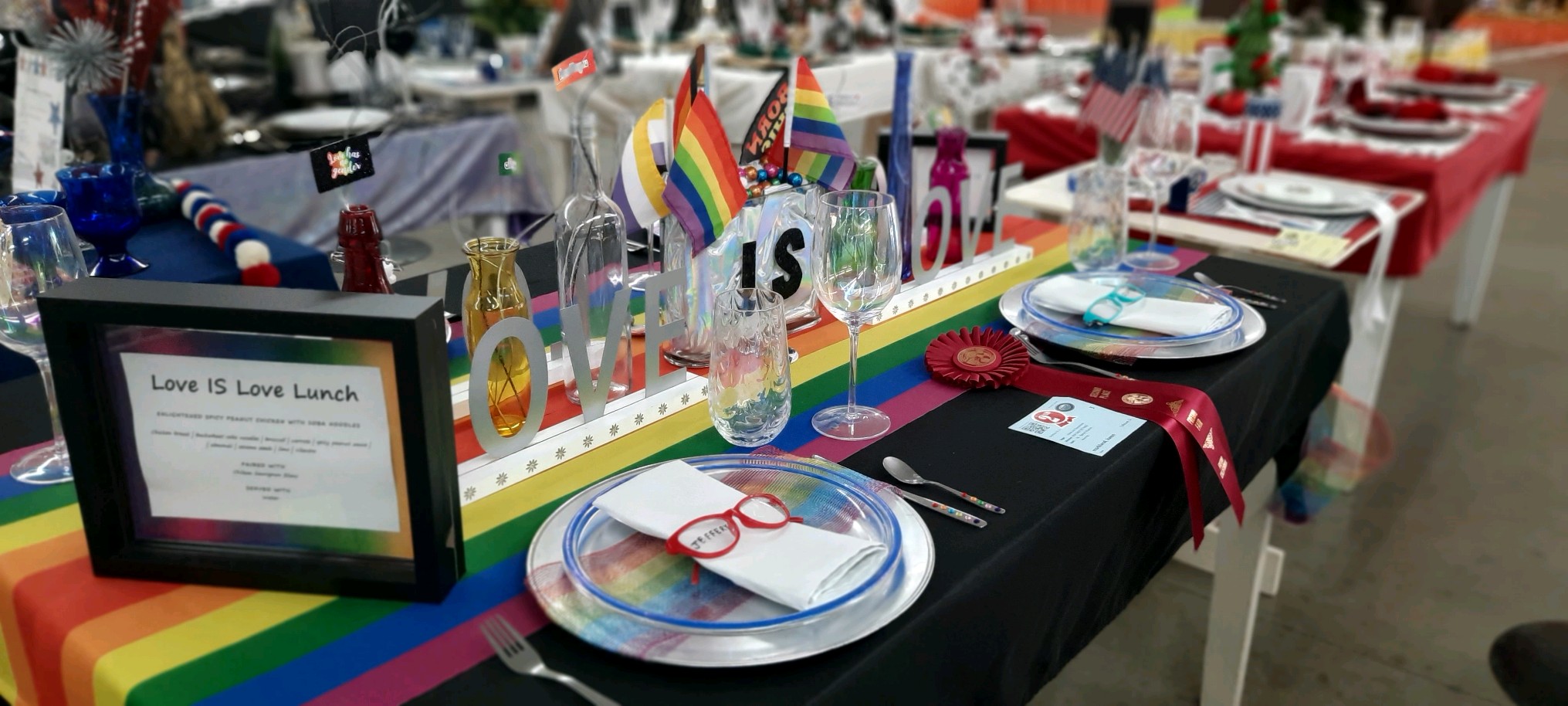 table decorated with Pride flags