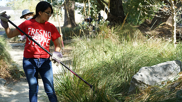 volunteer cleaning campus