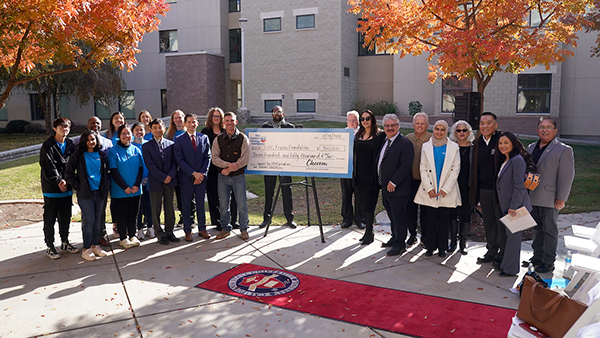 Chevron check presentation with Fresno State faculty and staff