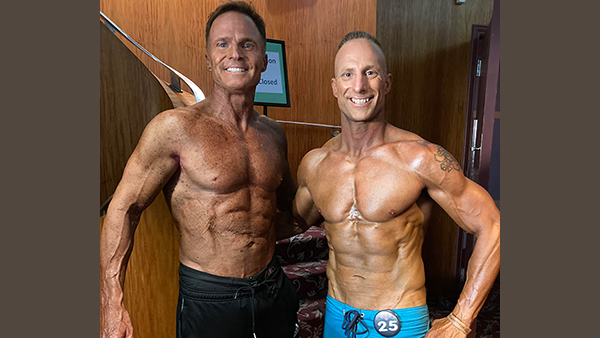 Robert Pagesmith and friend at body building contest
