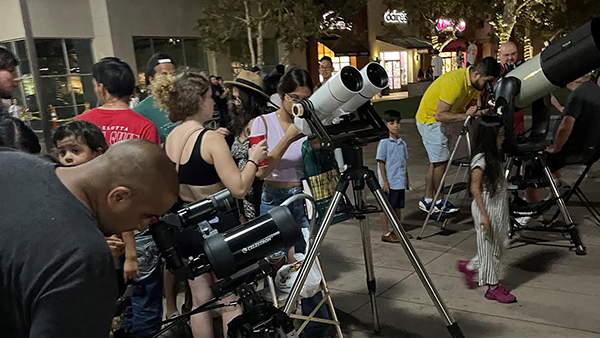 Sidewalk Astronomy event in River Park