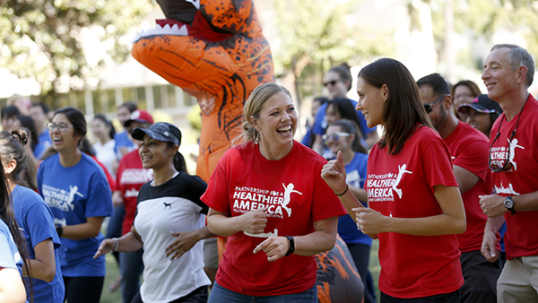 Employees participating in Red Wave