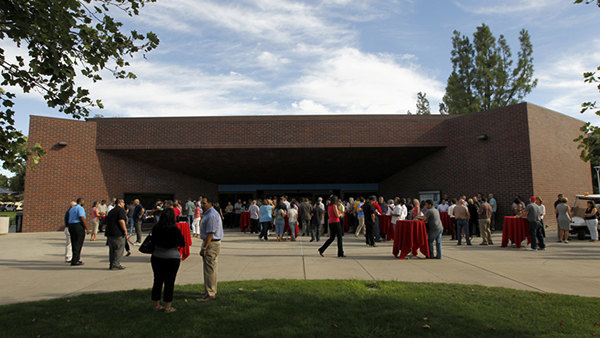 Employees in front of the Satellite Student Union