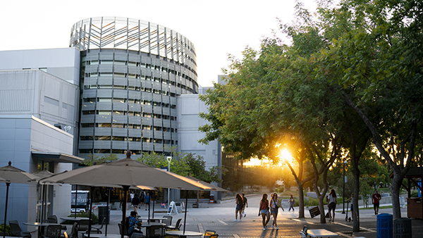 Sunset photo of the front of the Fresno State Library.