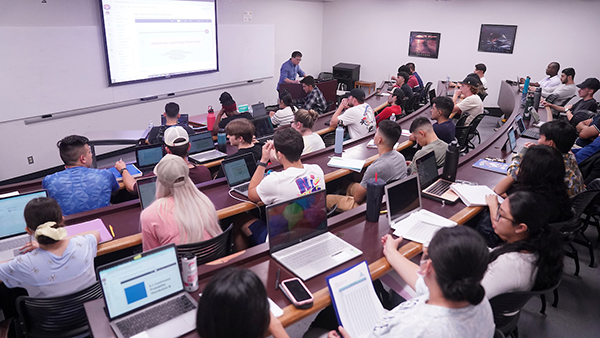 Professor in front of classroom