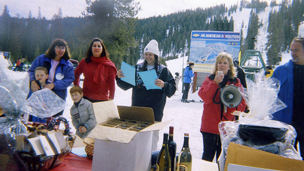 Employees in the snow at SnowFest.