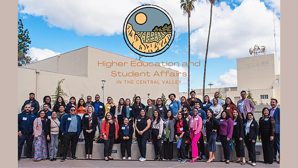 Participants of the HEAL conference with the conference logo and words include Higher Education and Student Affairs in the Central Valley.