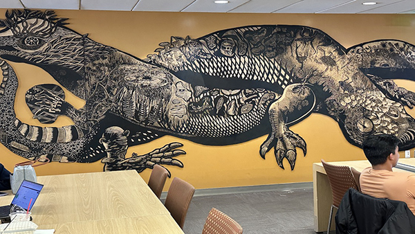 huge woodblock installation of The lizard and the salamander in the Library