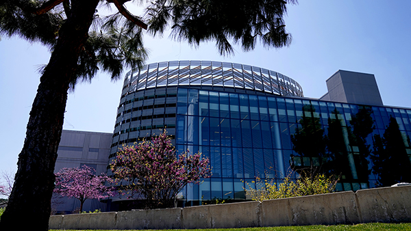 An exterior view of the Table Mountain Rancheria Tower, the five-story elliptical tower, at the entrance of the Fresno State Library.