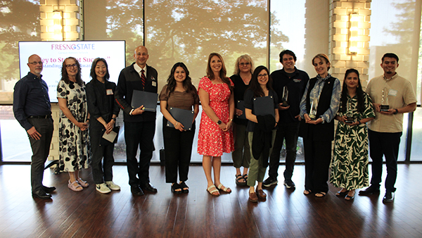 Photo of previous winners of the Outstanding Advisor Awards.