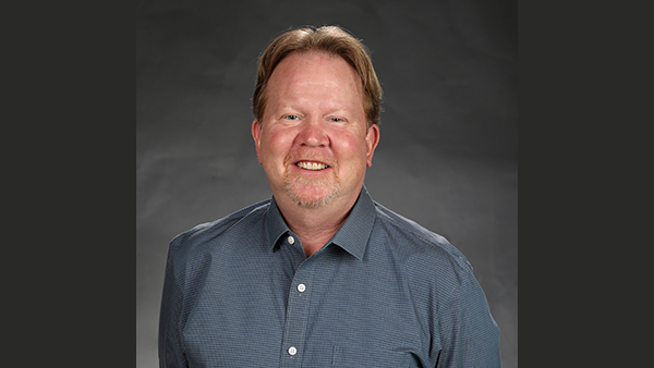 Headshot of Eddie West