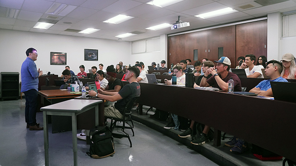 Professor in front of students in a classroom