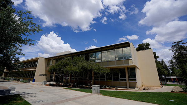 Exterior photo of the Professional Human Services Building at Fresno State.