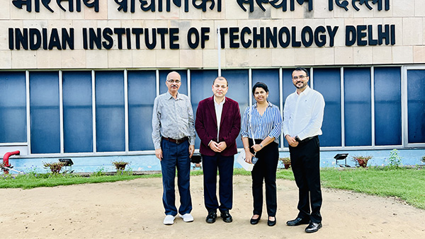 Dr. Mohan Dangi second from left standing in front of Indian Institute of Technology Delhi