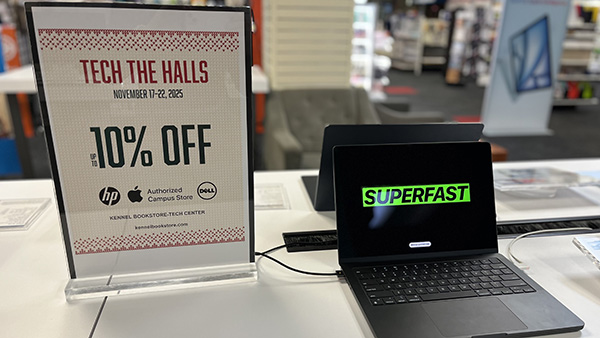 Tech the Halls discount sign and laptop at Kennel Bookstore