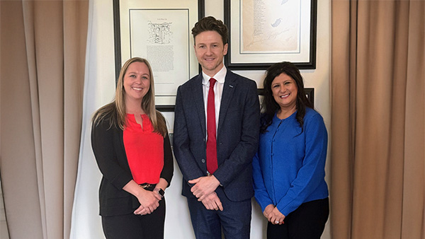 Melissa Norris, Matt Hawkins, vice president of Administration and Chief Financial Officer, and Belinda Munoz