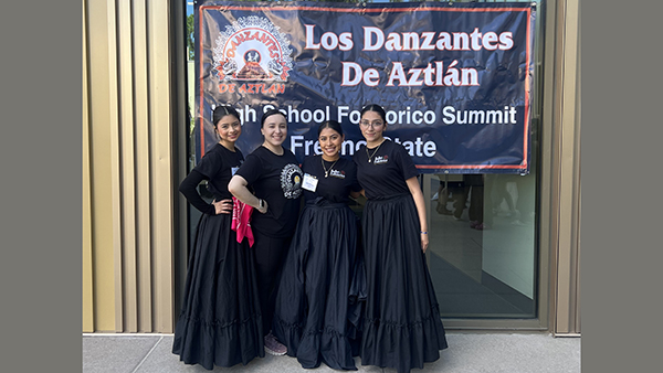 Mayra Aceves, second from left, with three other folklorico dancers.