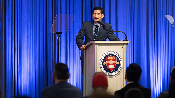 President Sa&uacute;l Jim&eacute;nez-Sandoval speaking at podium