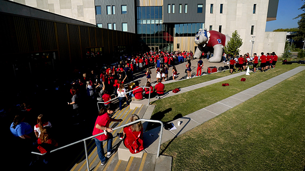 Faculty and Staff at Red Friday outside of the RSU