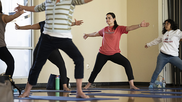 Women practicing yoga.